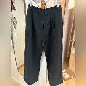 Farm Rio black wide leg pants. Size M